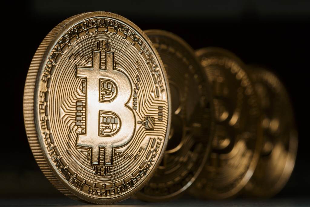 BERLIN, GERMANY - DECEMBER 06: A close-up view of an illustration model of a Bitcoin is seen on December 6, 2013 in Berlin, Germany. Central bankers around the world have warned about the virtual currency bitcoin. Prices have soared as more merchants accept it as payment and investors are pouring money into new bitcoin-related ventures. (Photo by Thomas Trutschel/Photothek via Getty Images)